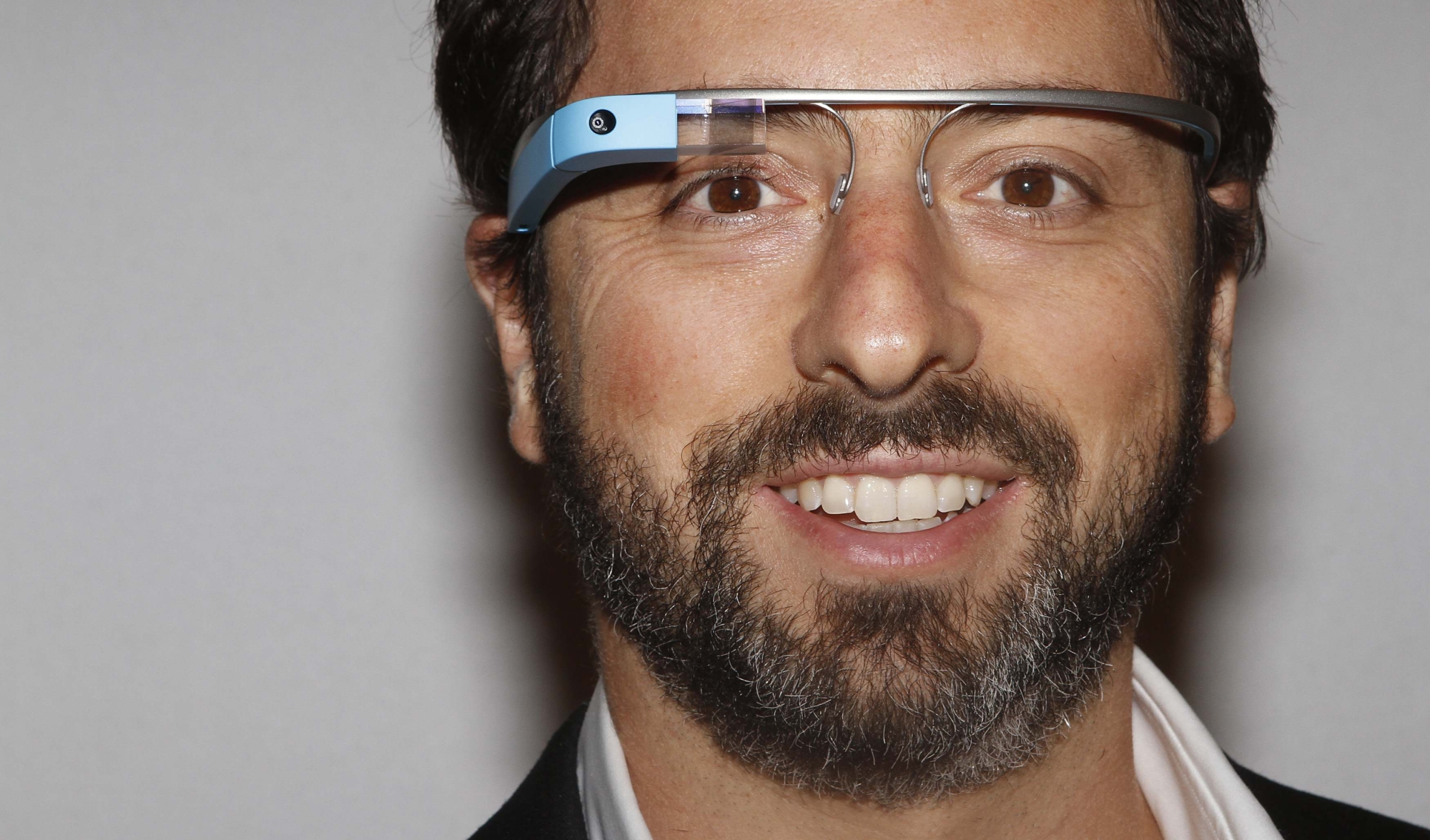 Google founder Sergey Brin poses for a portrait wearing Google Glass before the Diane von Furstenberg  Spring/Summer 2013 collection show during New York Fashion Week in this September 9, 2012 file photo. Social networking services Facebook Inc and Twitter are coming to Google Glass, the wearable computer made by the Internet search company. Google Inc announced on May 16, 2013 a half-dozen apps specially designed to work on its Glass devices. REUTERS/Carlo Allegri/Files (UNITED STATES - Tags: FASHION SCIENCE TECHNOLOGY BUSINESS) - File photo of Google founder Sergey Brin posing for a portrait wearing Google Glass during New York Fashion Week